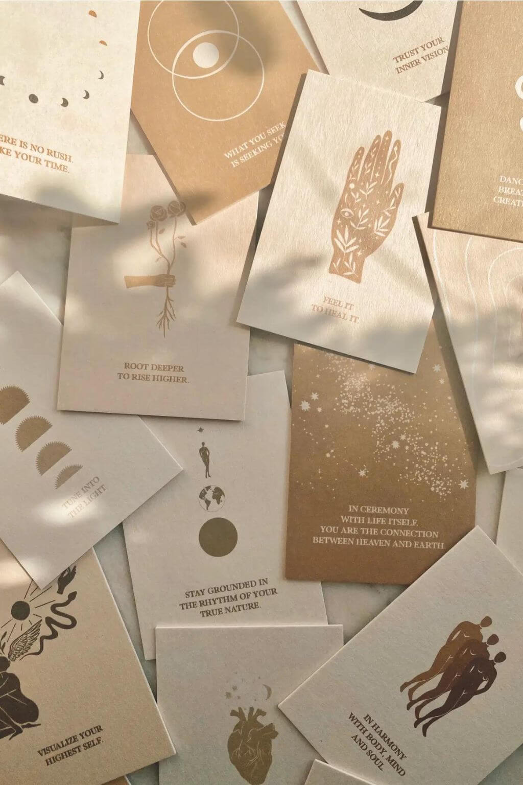 Overhead arrangement of Trust Your Inner Vision affirmation cards with symbolic artwork and reflective messages