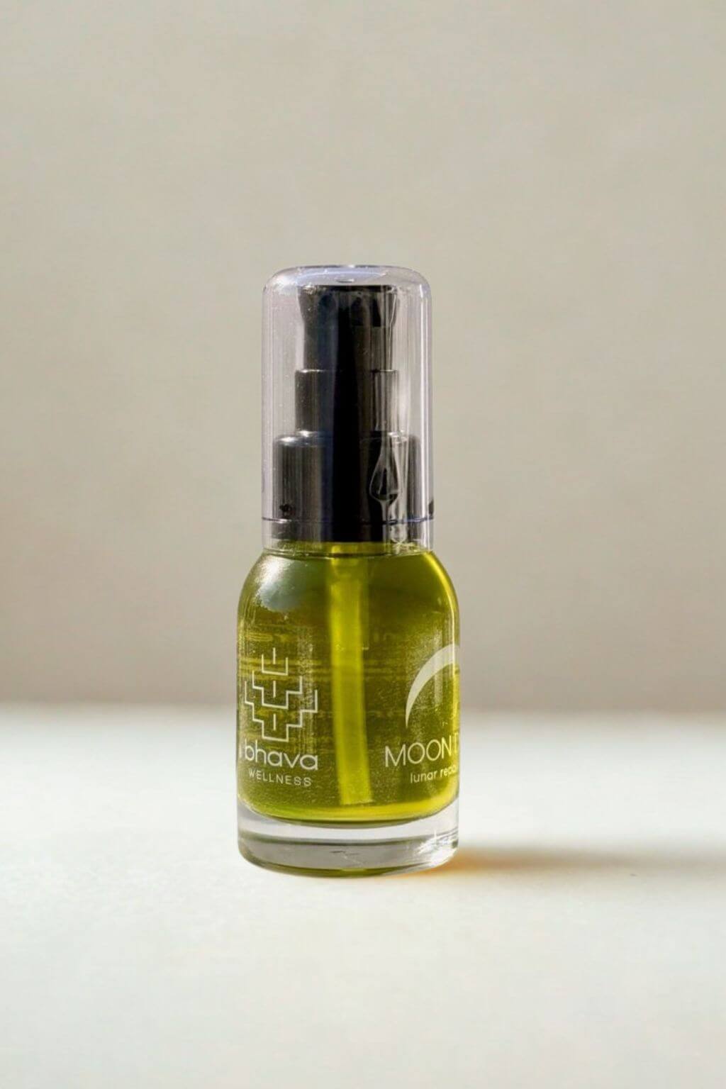Bottle of Bhava Wellness Moon Drops | Lunar Reparative Serum against a neutral background