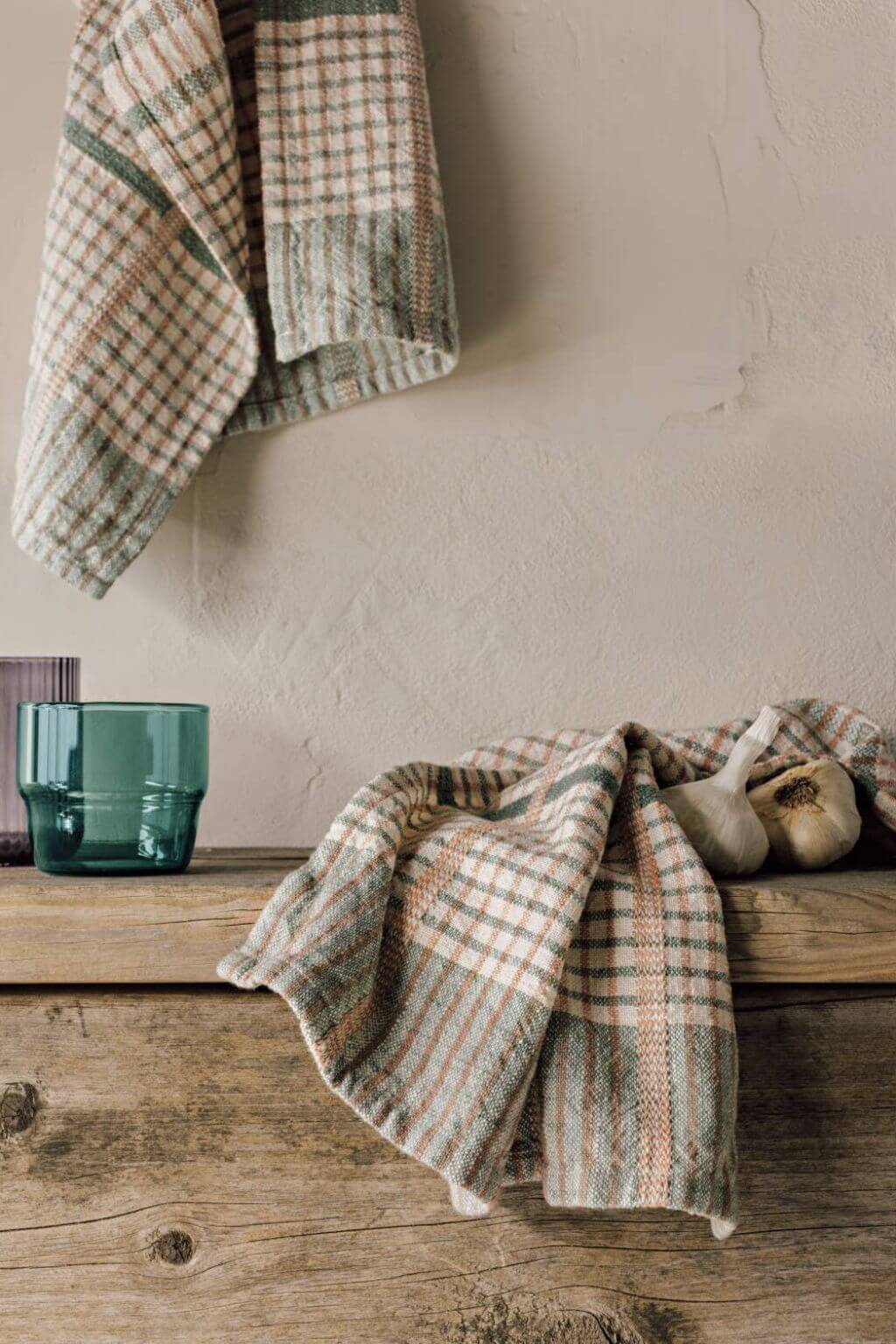 willow green check cotton dish towel hanging in rustic kitchen