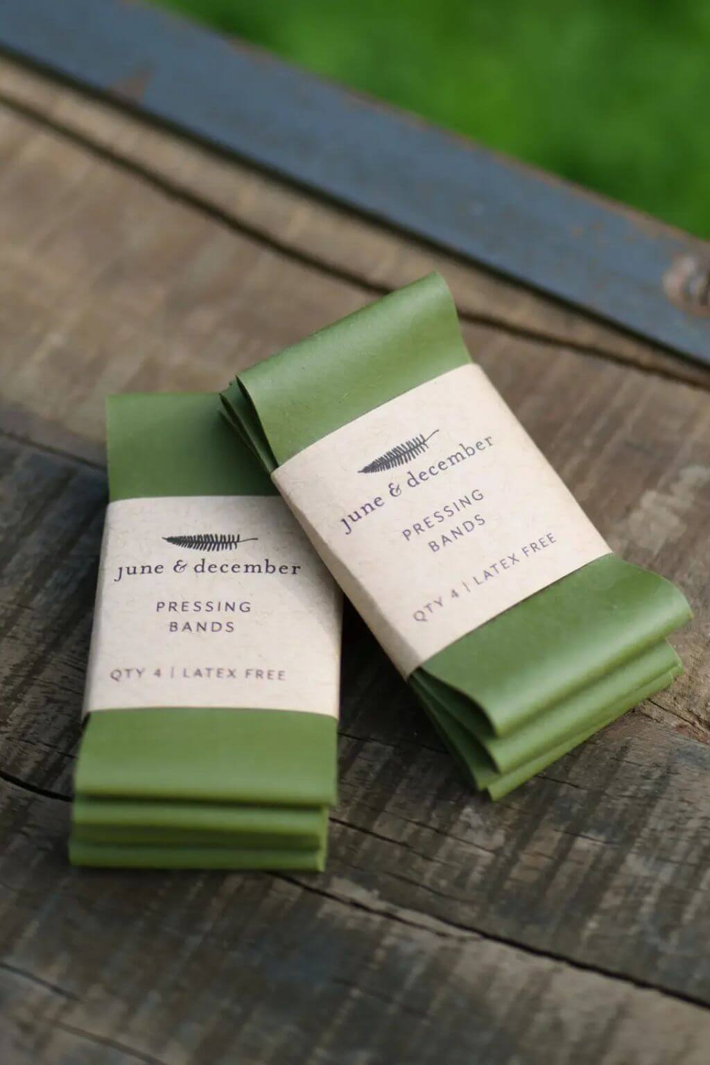Flower press pressing bands set in green packaging June and December