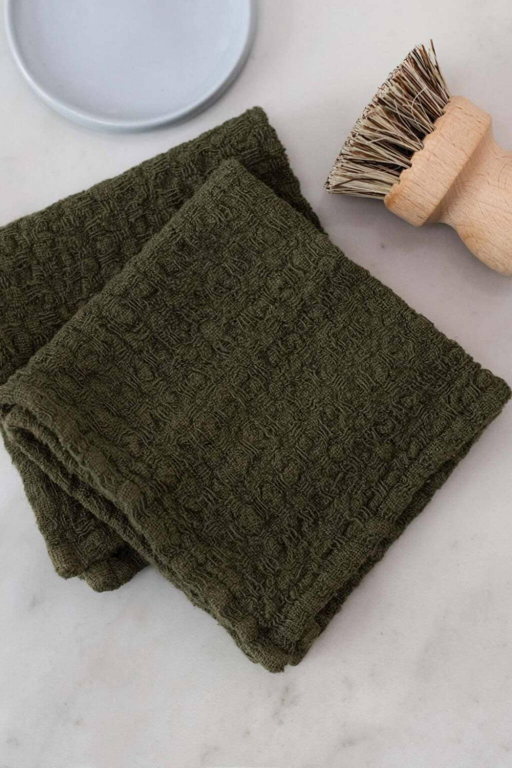 Martini olive waffle linen dishcloth paired with wooden scrub brush