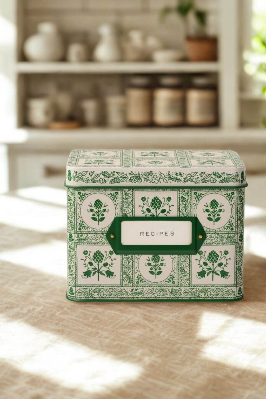 Rifle Paper Co. green artichoke recipe tin displayed in a cozy farmhouse kitchen