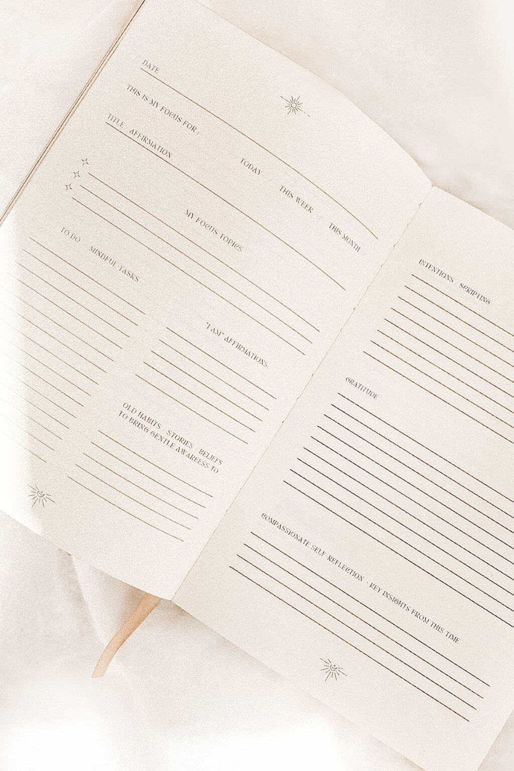 Open notebook with lined pages on a light background