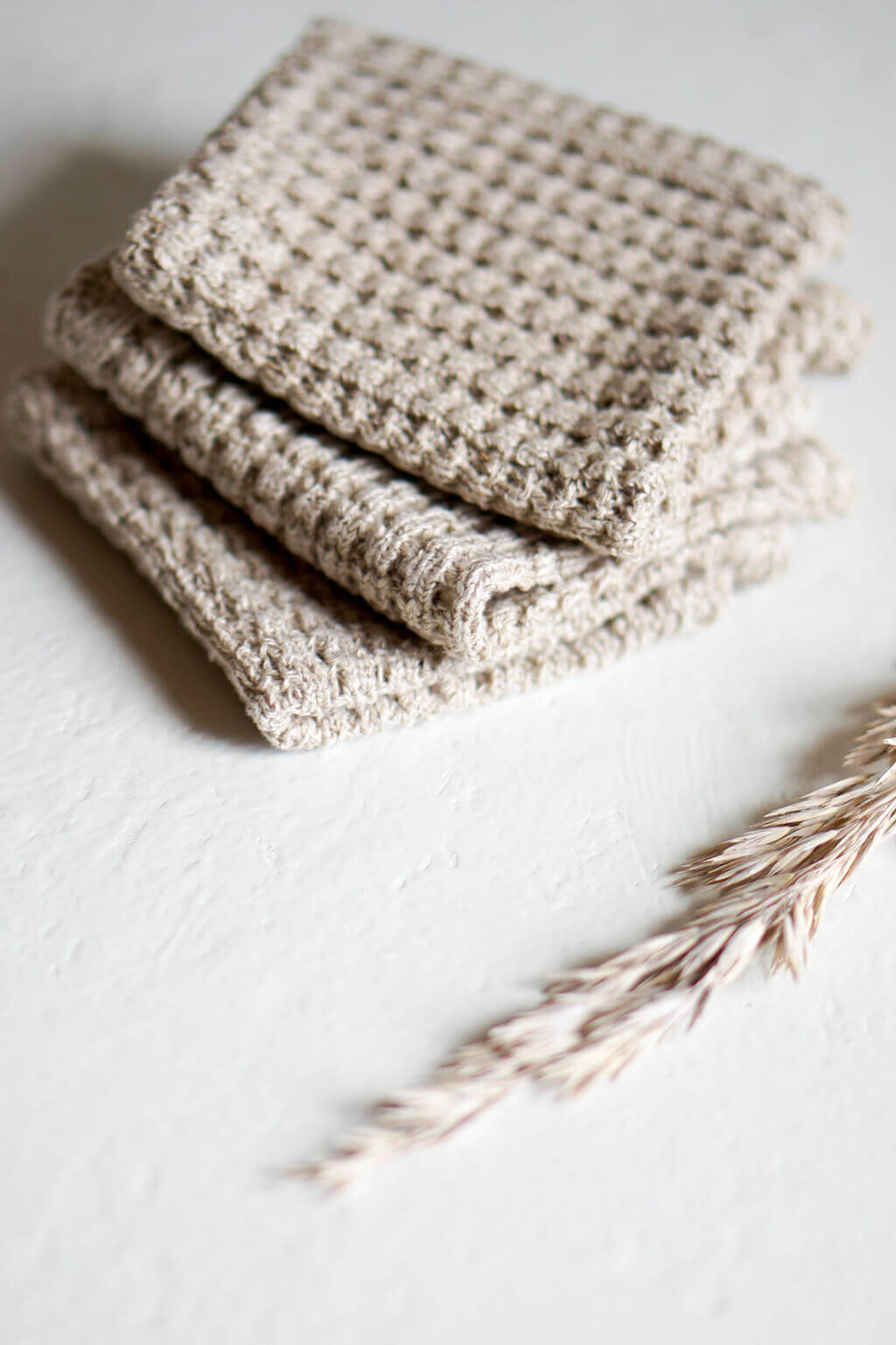 Stack of three andwoven hemp washcloths folded