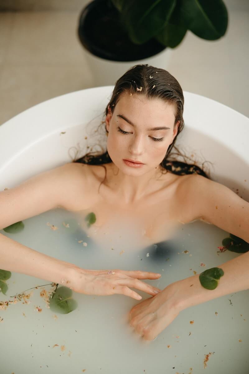 Dear Juniper : Gifts for Self Care Collection - woman filling the bathtub with water