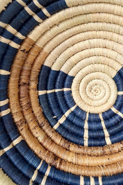 Close-up detail of handwoven raffia, banana bark, and sweetgrass basket