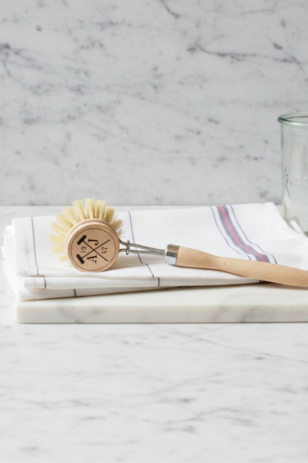 Wooden dish brush with natural bristles and ergonomic handle for everyday kitchen use