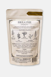 A stand-up pouch of Anima Mundi Apothecary's 'Breathe' tea, showing the back of the packaging with botanical illustrations and text on a white background.