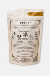 A stand-up pouch of Anima Mundi 'CALM' tea collection, showing the back of the packaging with botanical illustrations and text, on a white background.