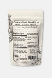 A pouch of Anima Mundi Organic Daily Cleanser supplement, showing the back panel with product details, ingredients, and directions on a white background.
