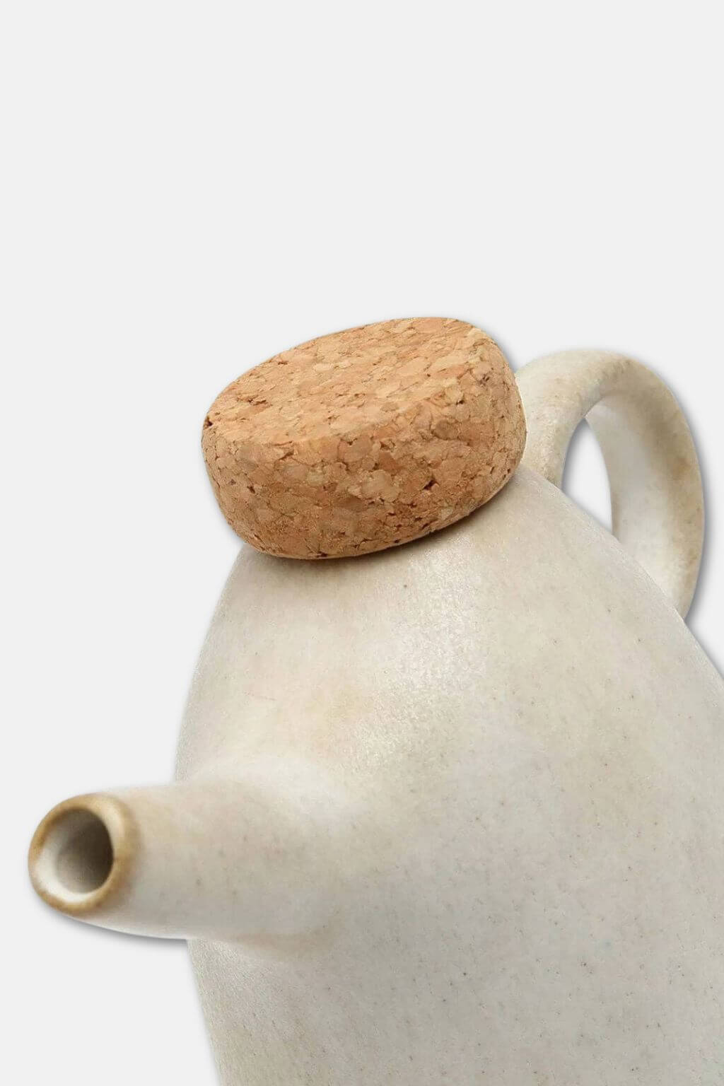 White ceramic olive oil bottle with minimalist design