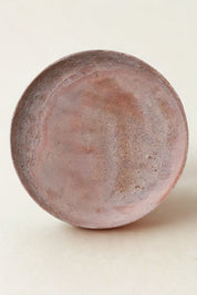 Natural red travertine stone tray with soft earthy tones and organic texture.