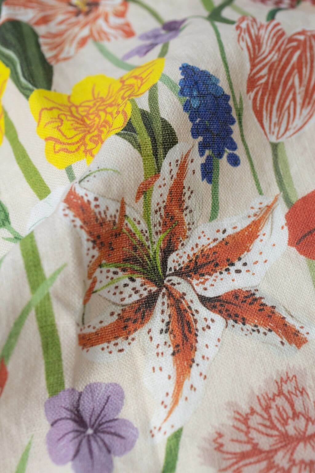 Botanical linen tea towel with lily and spring flowers