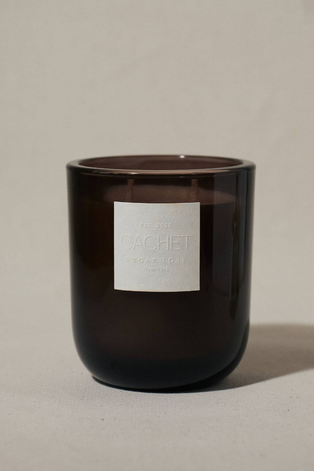 Cachet Botaniste refillable soy candle in smoky glass vessel