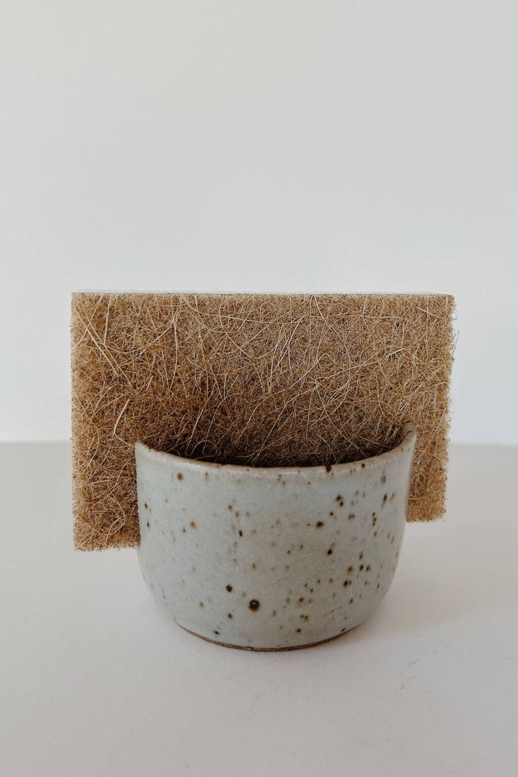 handcrafted ceramic sponge holder with natural coconut sponge