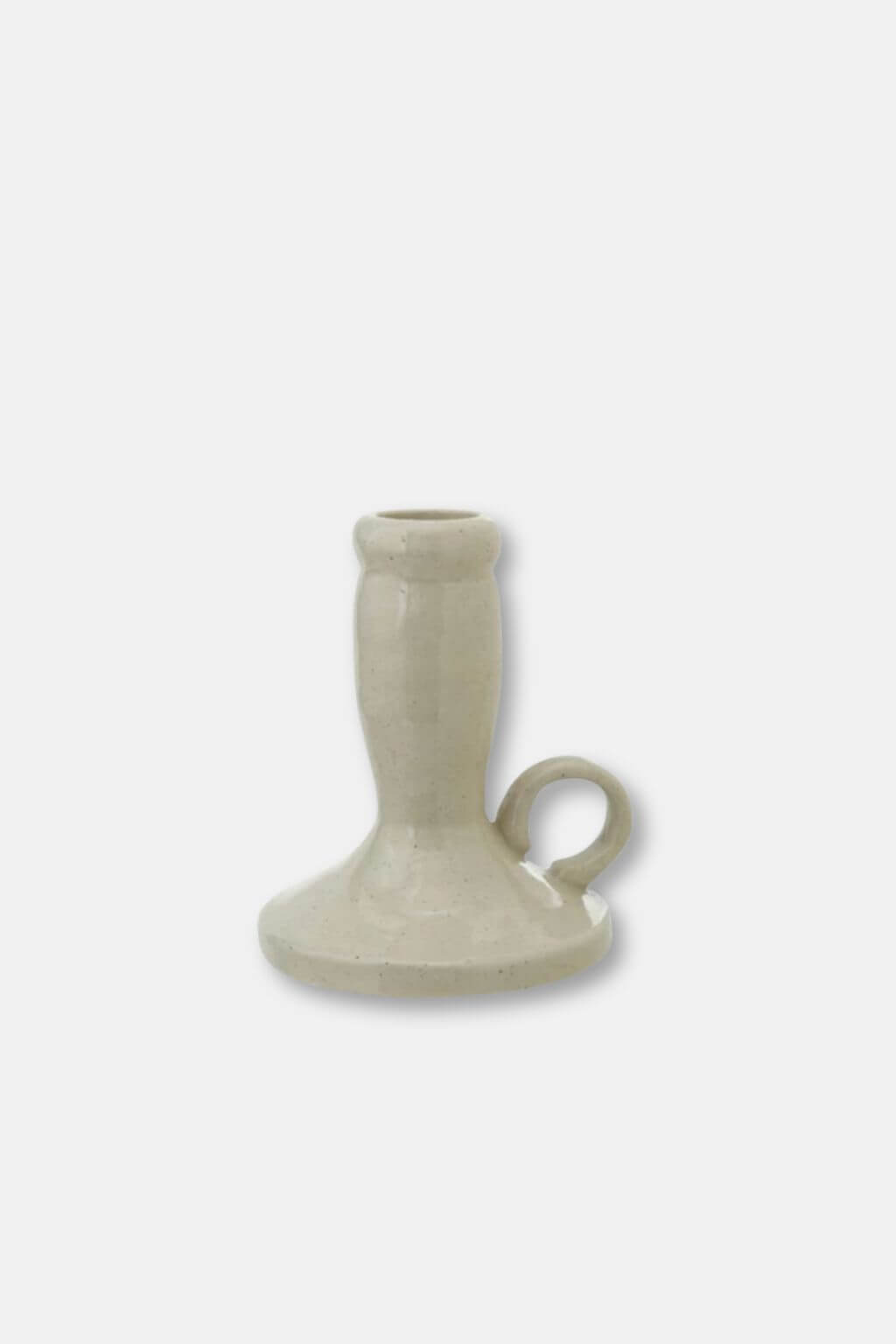 A small ceramic candle holder with a wide flared base and a loop handle on the right side, shown on a light gray background.
