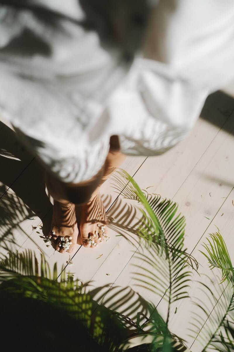 Dear Juniper: Woman Amongst Ferns, Minimizing Ecological Footprint