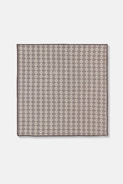 Close-up of woven dishcloth in shadow gray and cream pattern, made from cotton.