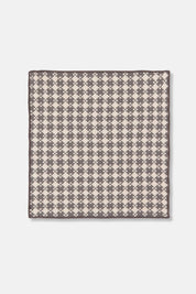 Close-up of woven dishcloth in shadow gray and cream pattern, made from cotton.