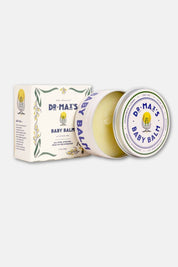 Open tin of baby balm showing creamy texture