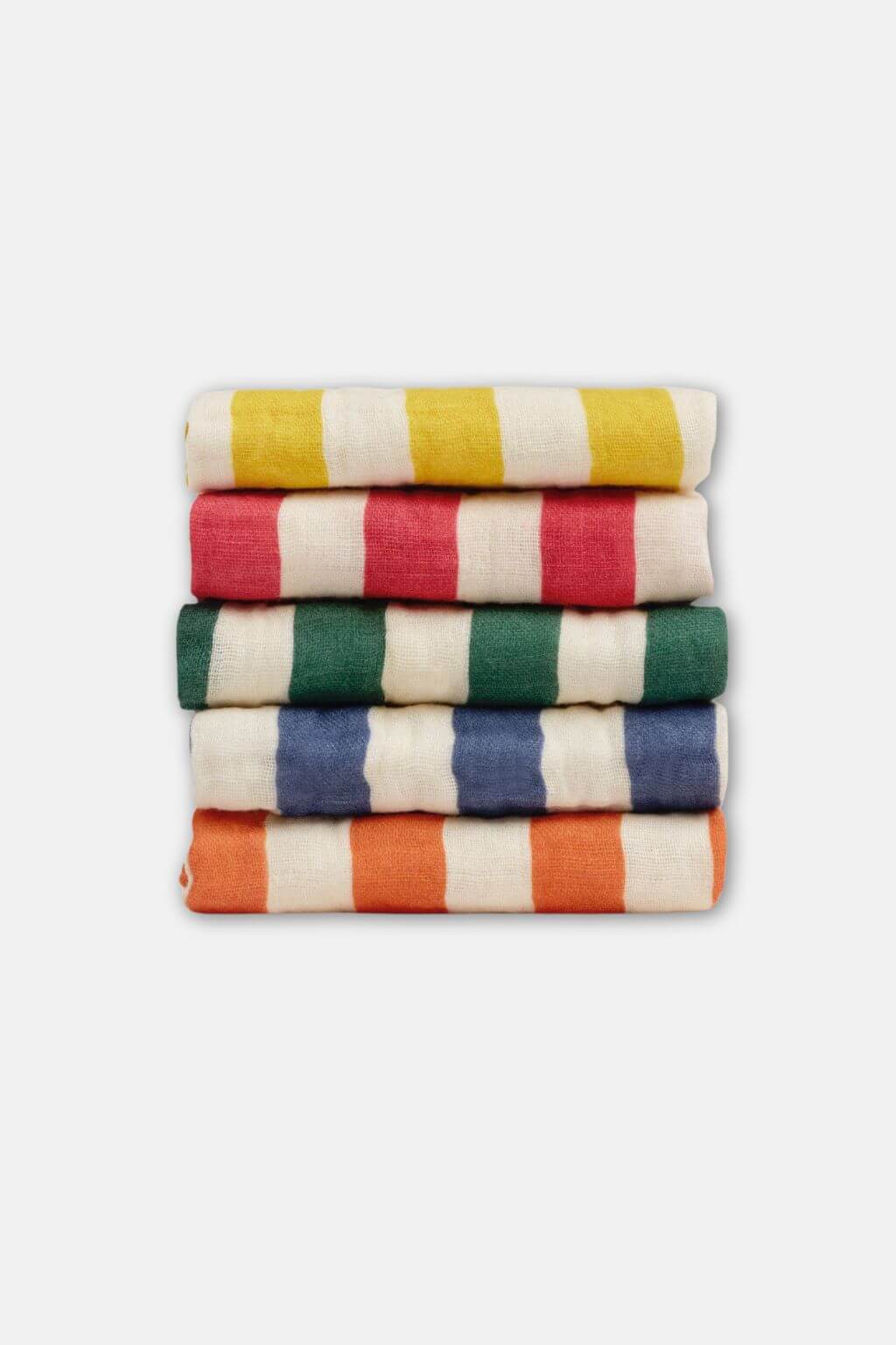 stack of vibrant striped organic cotton washcloths in yellow red green blue and orange