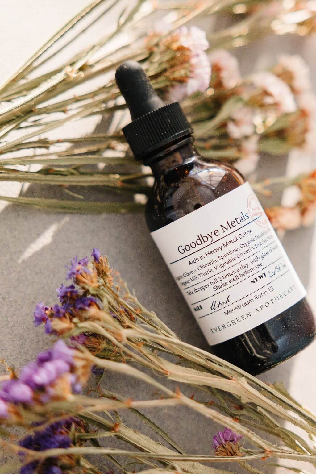 evergreen apothecary goodbye metals heavy metal detox tincture with dried flowers