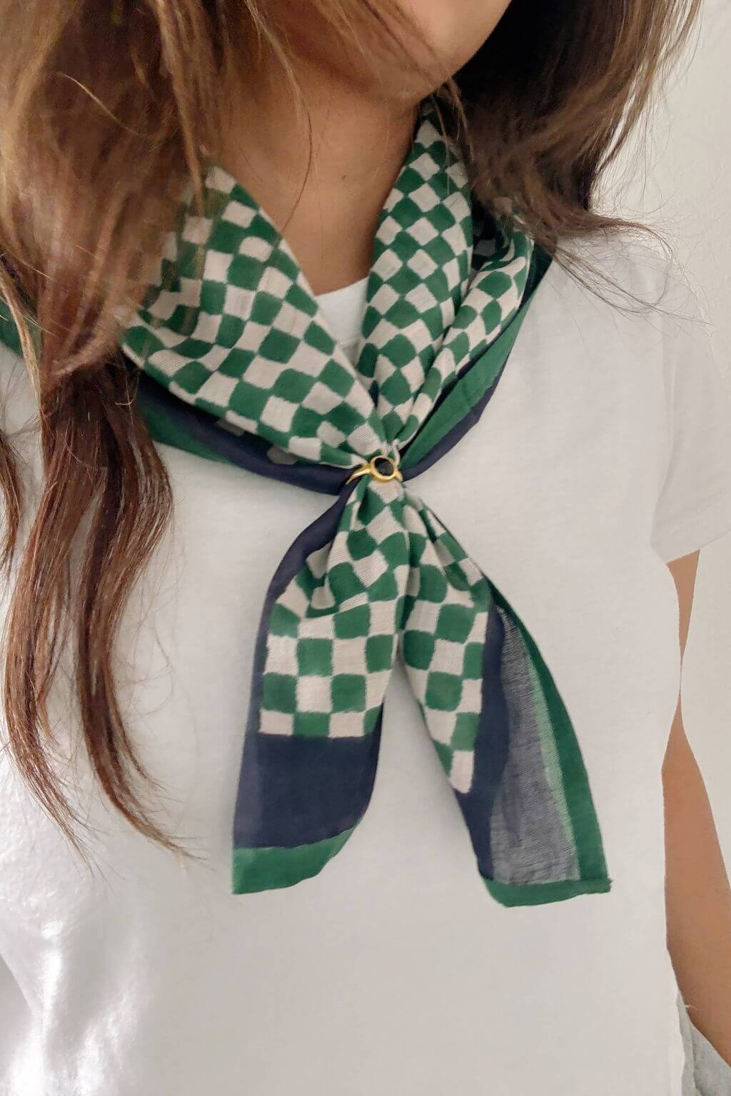 woman wearing green checkered matcha bandana scarf with navy border