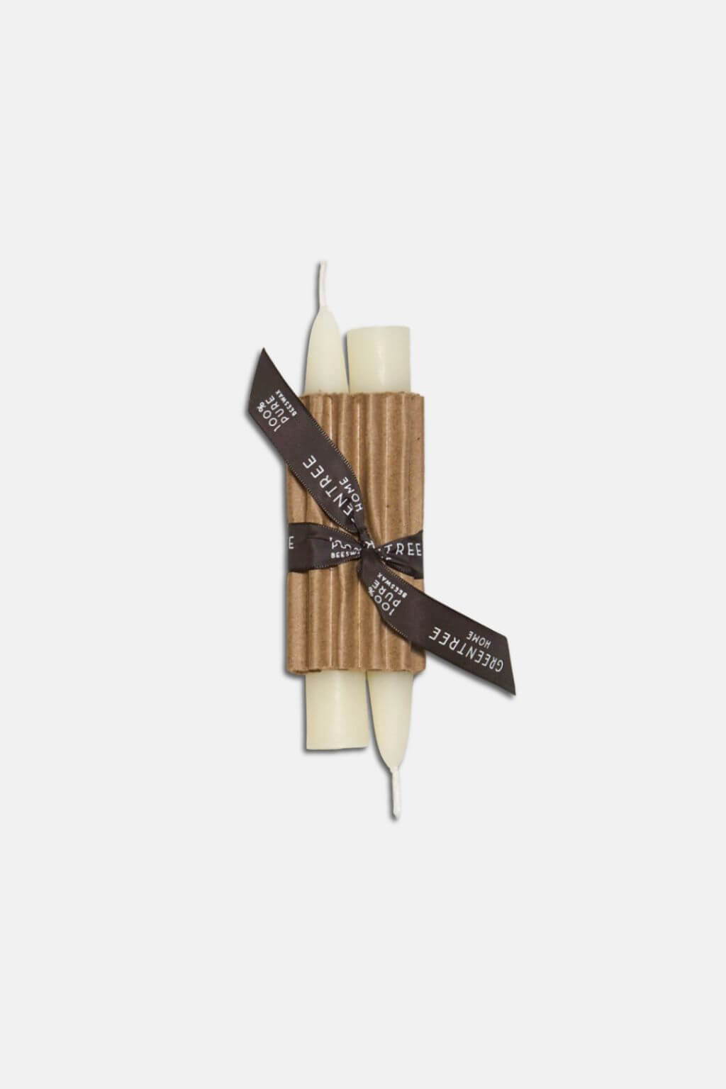 Two 6" Cream Beeswax Taper Candles wrapped in brown paper with a black ribbon on a white background