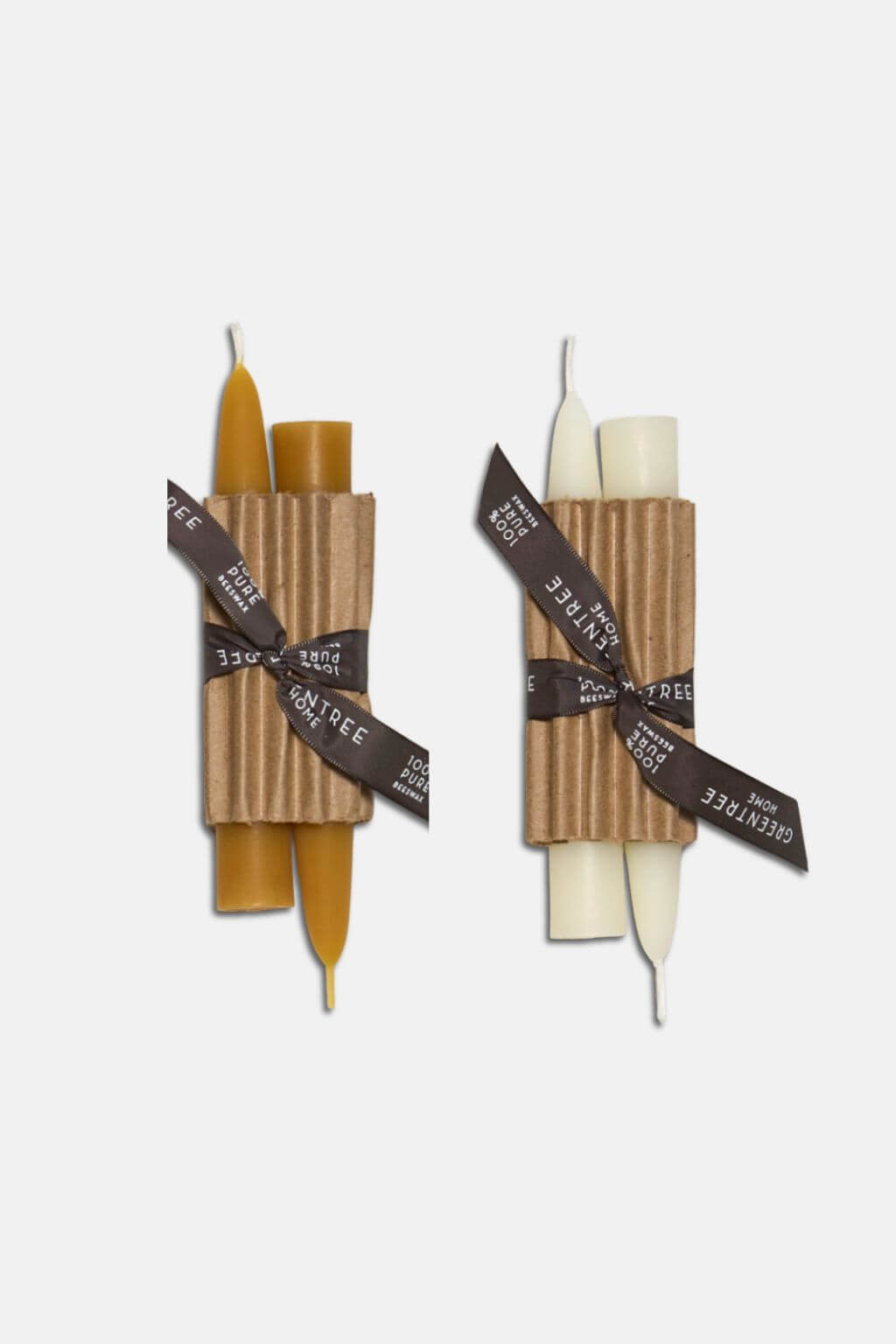 Two sets of 6" Beeswax Taper candles wrapped in brown paper with black ribbons on a white background