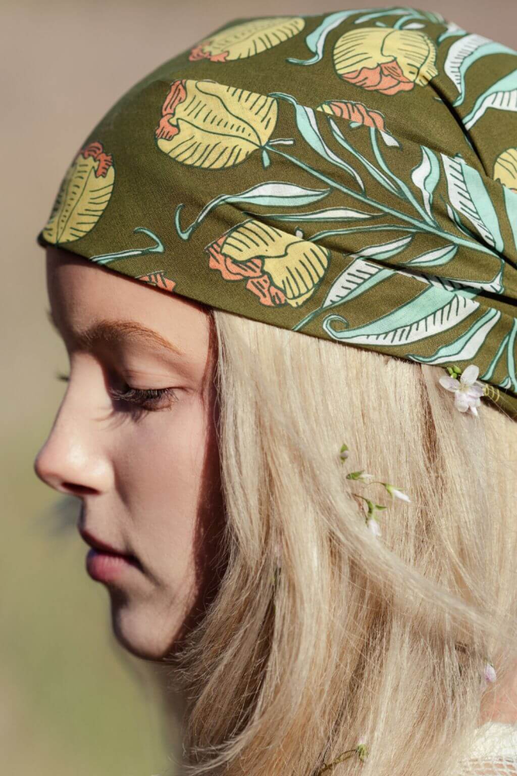 Side close-up of model wearing bandana