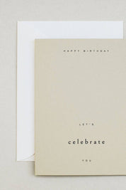Birthday card with natural envelope showing minimal design and warm paper tone