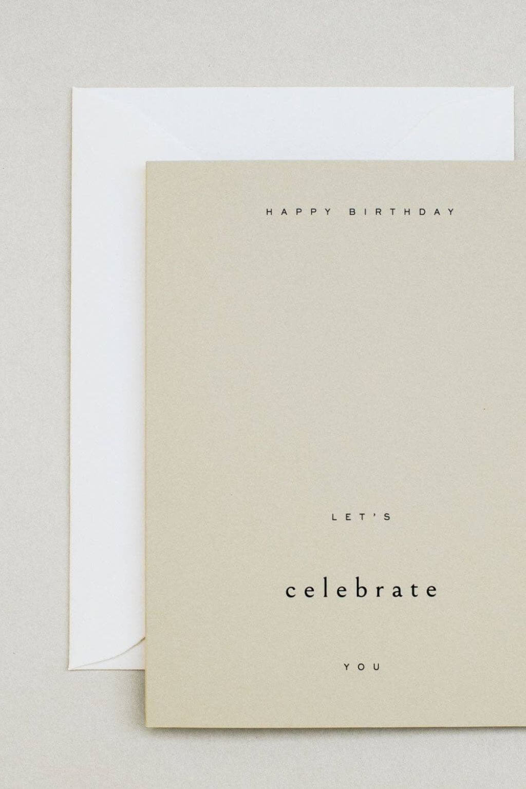 Birthday card with natural envelope showing minimal design and warm paper tone