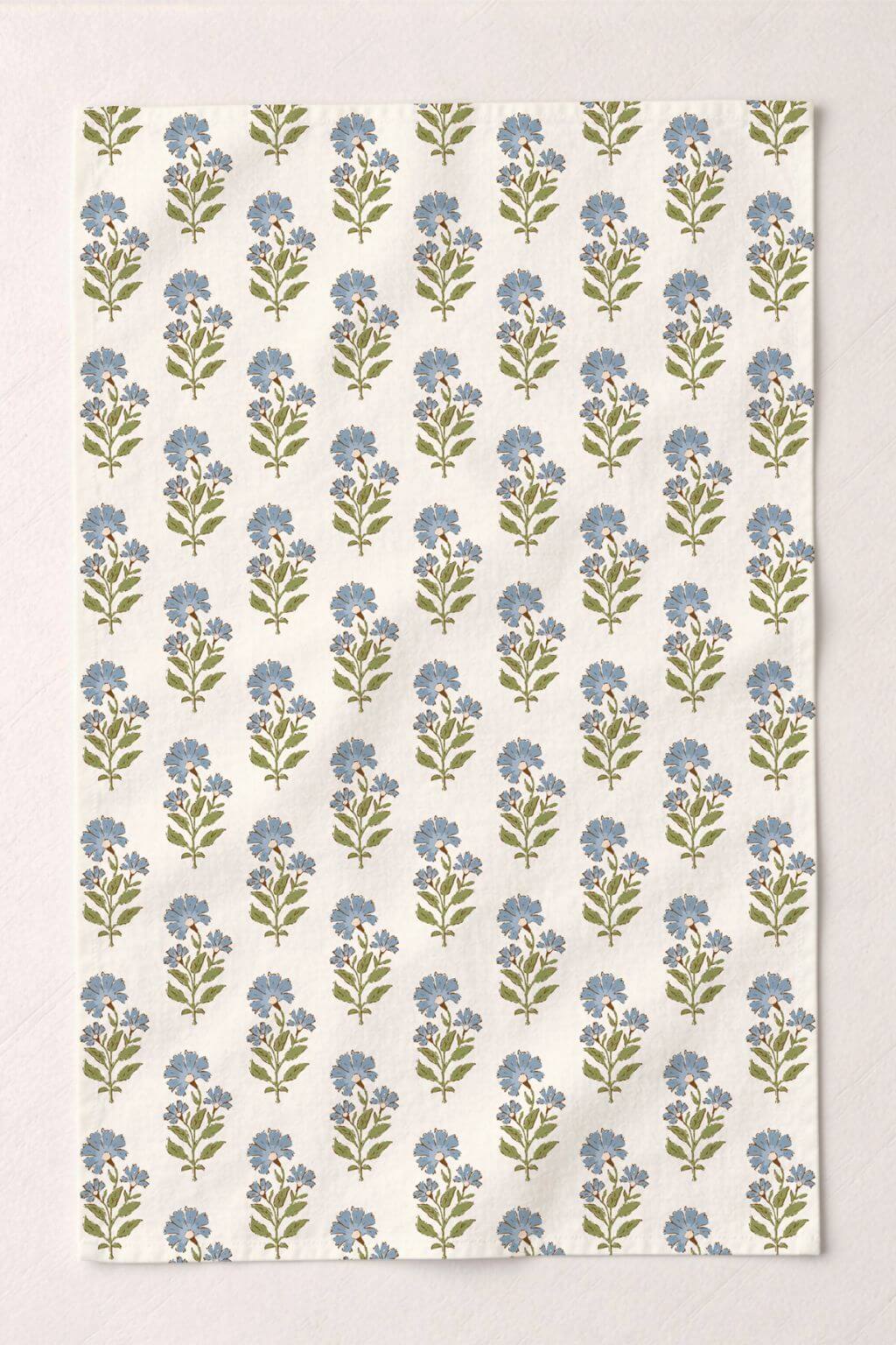 European linen tea towel with repeating blue floral pattern