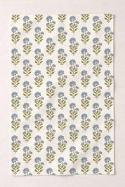 European linen tea towel with repeating blue floral pattern
