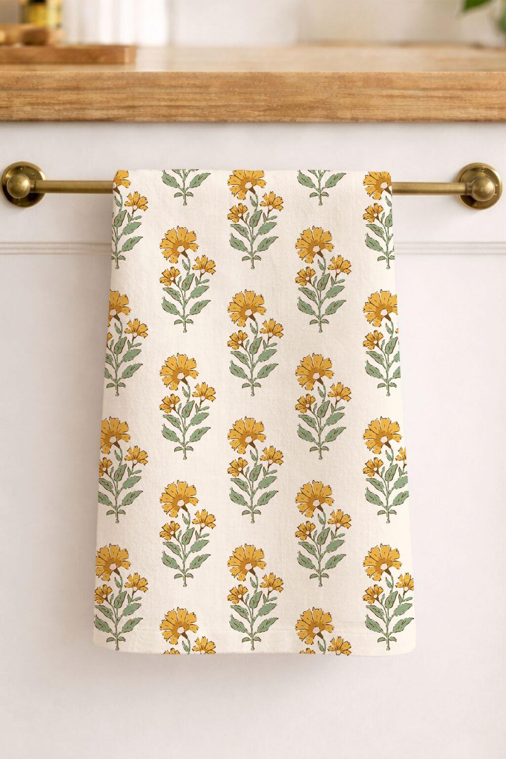 Marigold linen tea towel hanging on brass bar kitchen