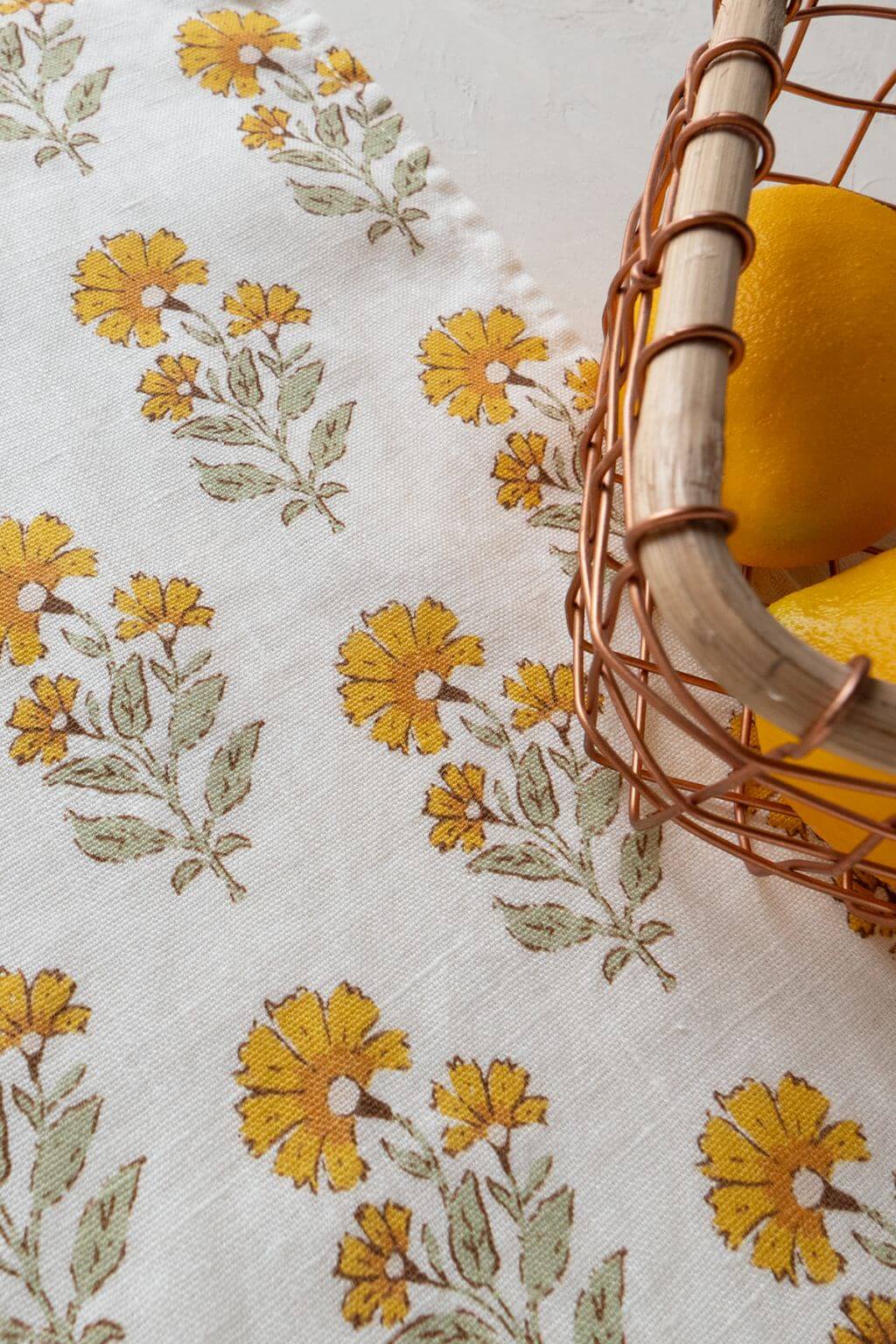 Close-up marigold pattern on European linen tea towel