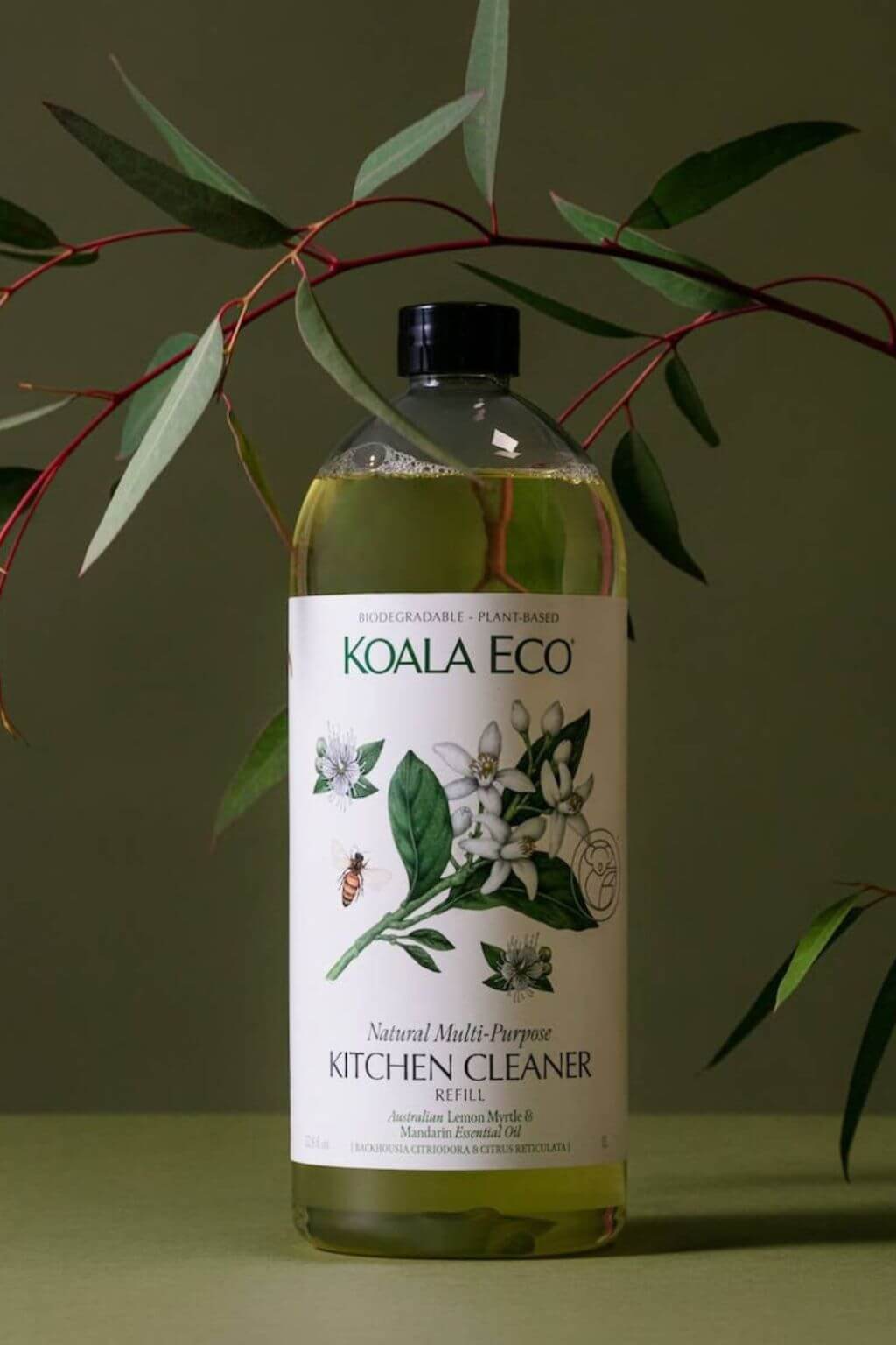 Koala Eco Natural Multi-Purpose Kitchen Cleaner Refill Bottle with botanical label and leaves in the background