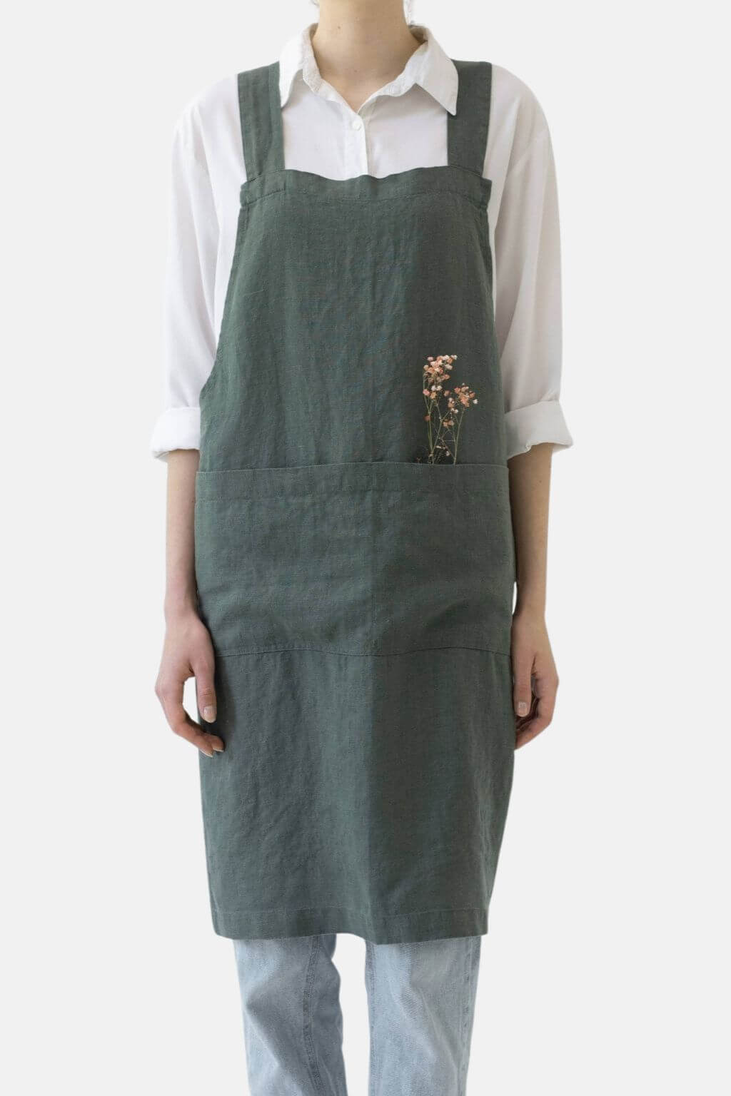 Forest green linen Japanese cross back apron with front pocket detail