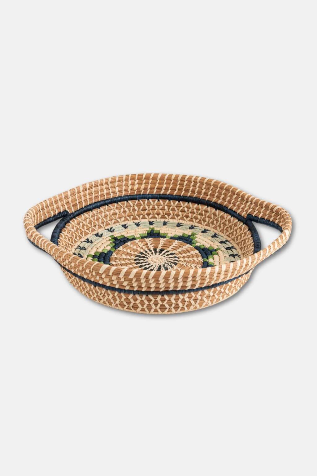 Woven basket with decorative pattern on a white background