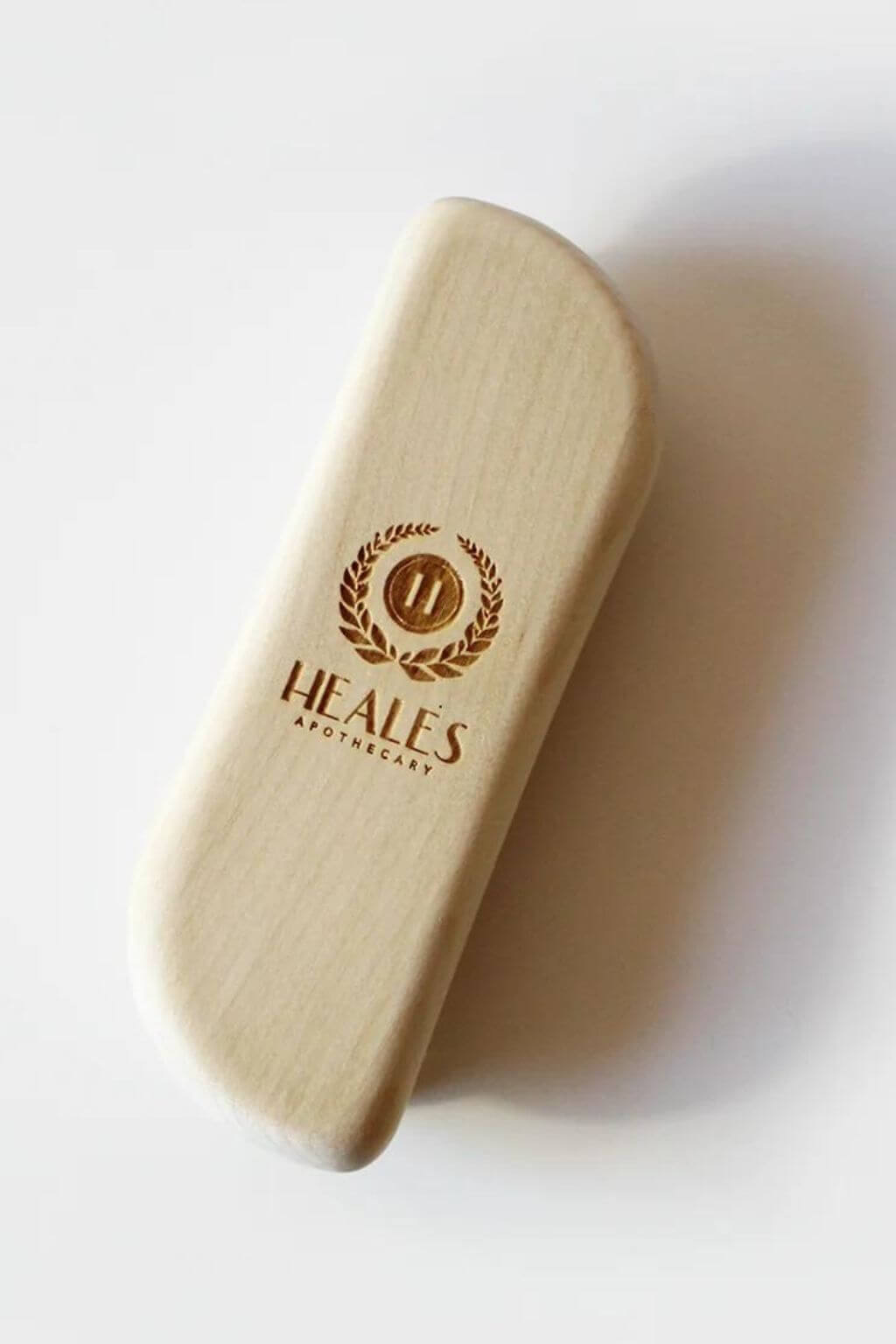 Close-up of wooden massage nodes on fascia massage brush