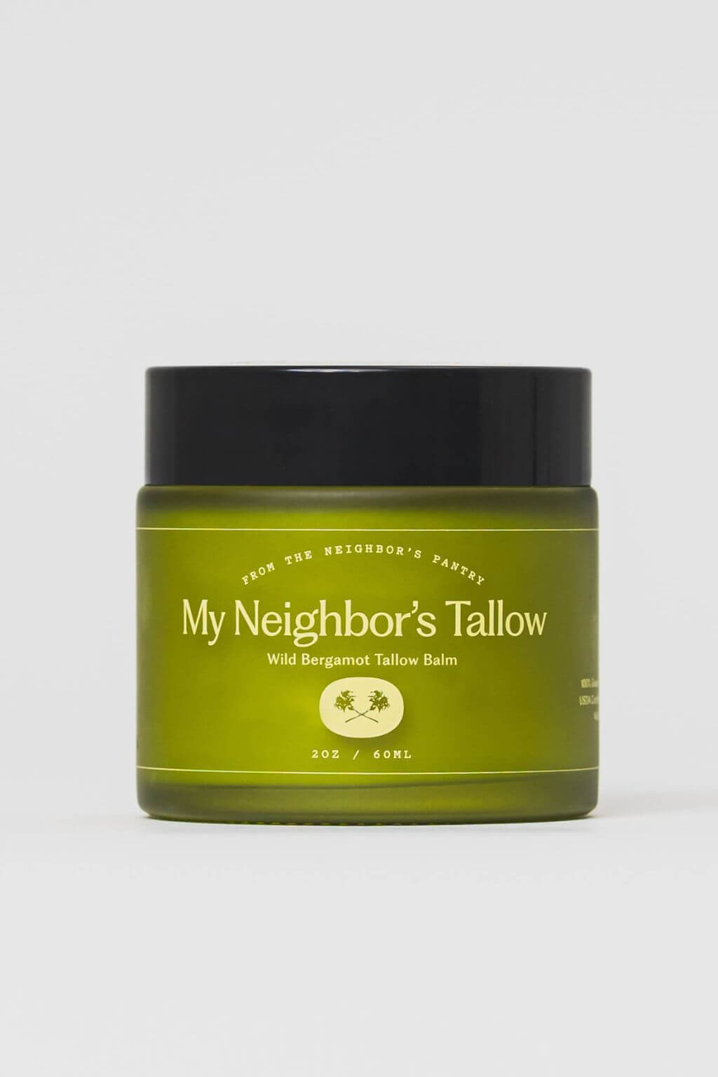 Front view of wild bergamot tallow balm jar packaging