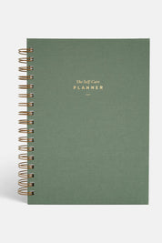 Sage Green Self Care planner with gold text on a white background