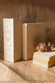 Beige Lucid Dreams Tarot Deck by St Soleil gift box, guidbook and towels against a neutral background