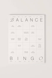 A minimalist balance bingo card with a clean white background and black text, featuring categories like 'BALANCE' and 'BINGO' with small daily prompts.