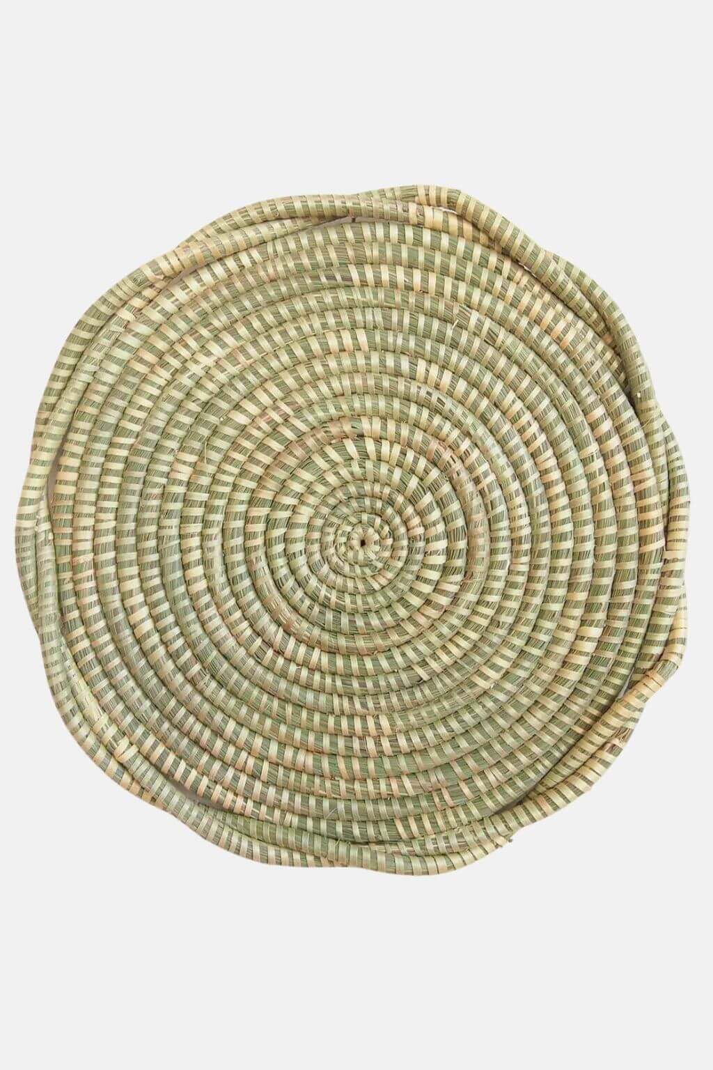 Round handwoven sweetgrass trivet with spiral pattern in natural green and straw tones