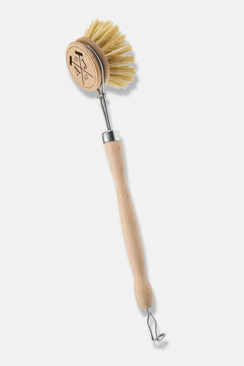 A French beech wood handled dish brush with a synthetic bristle head and a metal picker.