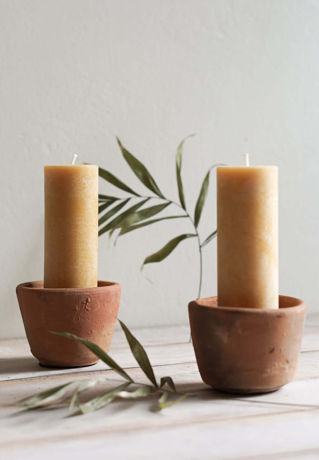 terracotta candle holder with beeswax pillar candles