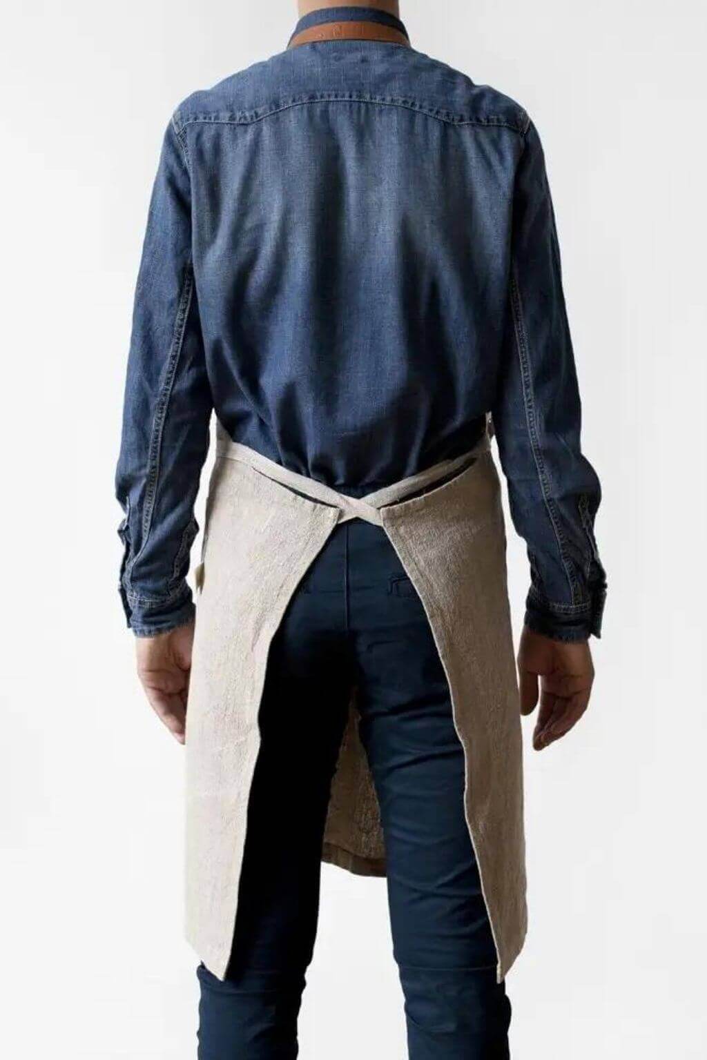 Back view of luxury linen apron showing cross-back tie design